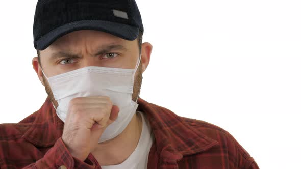 American Farmer in Medical Mask Coughing on White Background.
