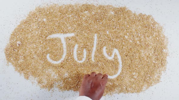 Hand Writes On Sand July