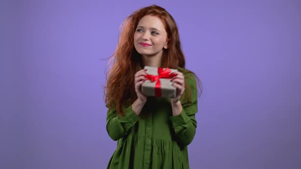 Excited Woman Received Gift Box with Bow