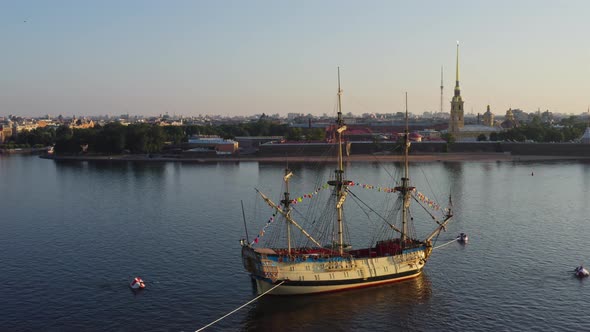 Aerial Morning Urban Landscape with a Replica of the Ancient Frigate Poltava Against the Background