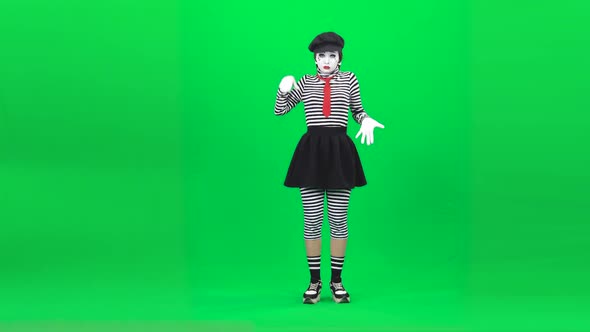 Mime Putting Hands on Invisible Glass