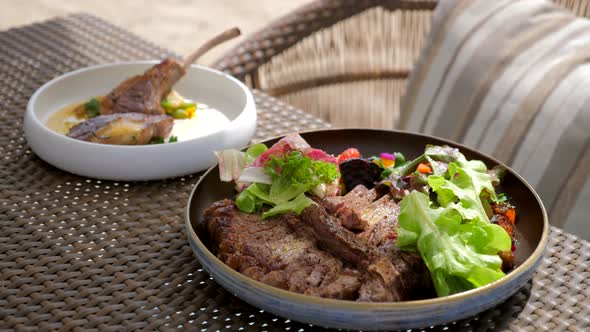 Meat Keto Carnivore Diet  Fresh Beef and Lamb Steaks with Salad and Vegetables