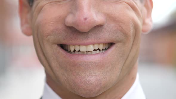 Smiling Face of Businessman Lips
