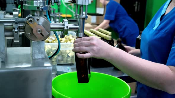 Filling of Olive Oil Bottles in a Bottling Factory