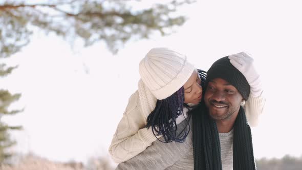 Stylish Couple Walking and Having Fun in the Countryside in Winter