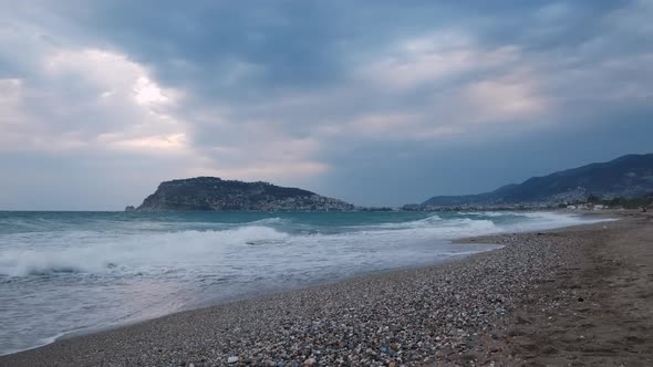 Sea waves hitting and crashing on beach