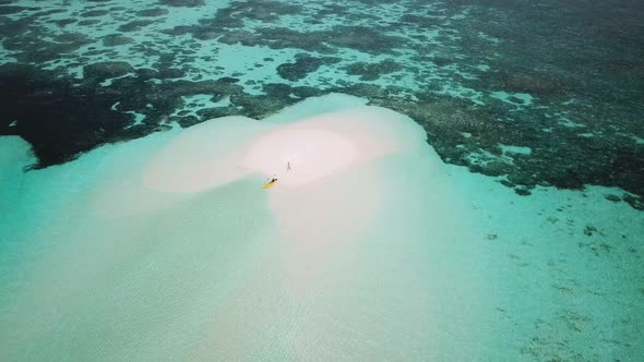 Me Walking Alone on a Sandbar in Maldives with a Parked Kayak