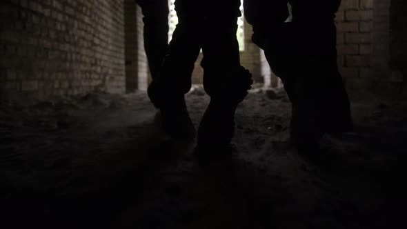 Soldiers Dragging Wounded Warrior From Battlefield alt