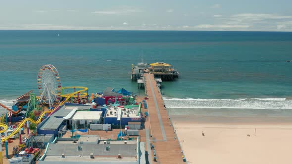 Famous Adventure Park on the Santa Monica Pier at Pacific Ocean Shore. COVID-19 alt