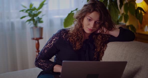 Portrait of Woman Working on Laptop Computer