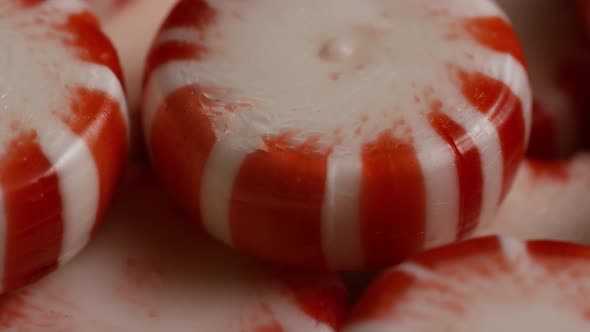 Rotating shot of peppermint candies - CANDY PEPPERMINT 065