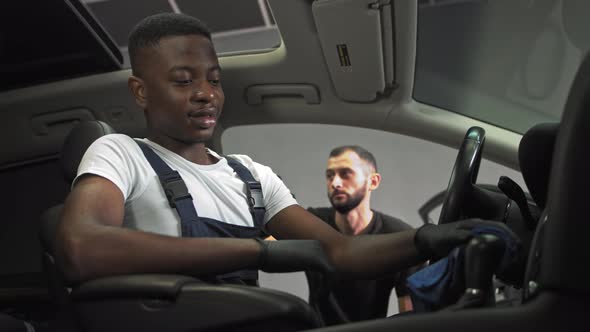 African American Came To Work Helps To Wash Car Interiors Cheerful Young Man