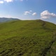 Aerial flight over green hill mountains. FPV Dynamic drone shot - VideoHive Item for Sale