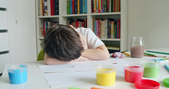 Child is Sleeping on Table