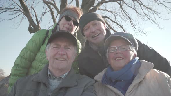 Happy Smiling Seniors Looking in Camera