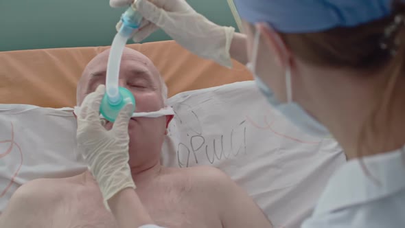 Elderly Man on Oxygen Therapy