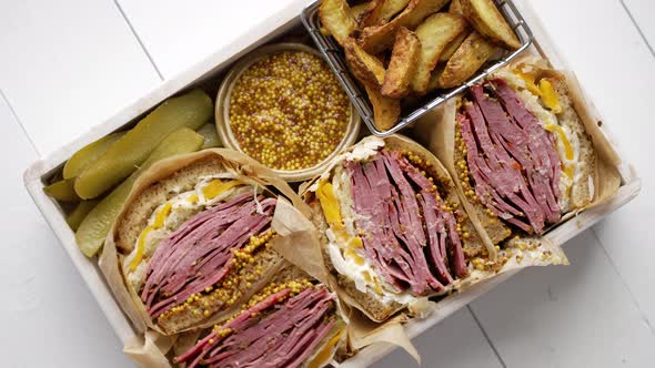 Enormous Sandwiches with Pastrami Beef in Wooden Box