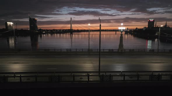 Sunset Over Riga Near the Bridge at Night