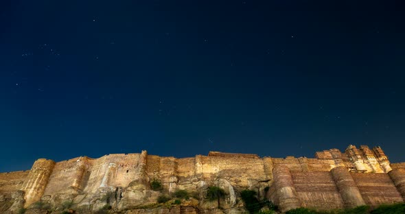 Time lapse of the turning starry sky above Jodhpur fort with Orion constellation, Rajasthan, India