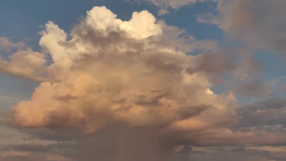 Epic Sunset Over The Sea Shore With Clouds. Dark Sunset. Orange Blue Sunset After Rain. Huge Clouds