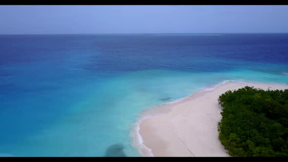 Aerial top view seascape of paradise tourist beach holiday by aqua blue ocean and clean sand backgro