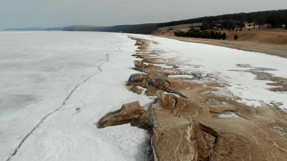 Aerial View Above Famous Lake Baikal in Winter Ice Cubes and Snow