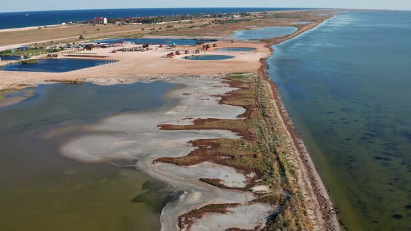 Beautiful flight in summer over salt lakes. Dry lakes. Green grass.