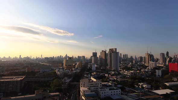 Bangkok cityscape day to night timelapse in Thailand reveals the metropolitan urban skyline and buil alt