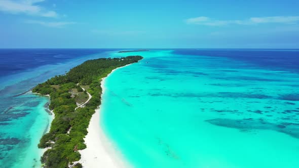 Aerial top view nature of idyllic lagoon beach journey by blue sea with white sand background of a d