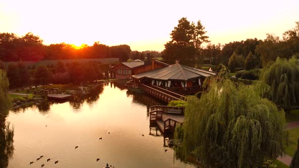 View From Drone Flying Over Wellgroomed Park Pond