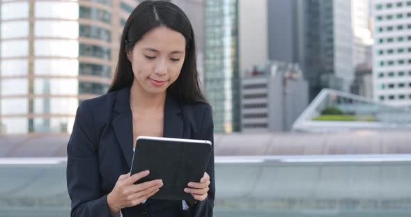 Businesswoman working on tablet computer 