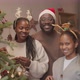 Happy African-American Family Posing at Christmas - VideoHive Item for Sale