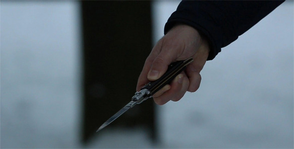 Switchblade In Male Hand