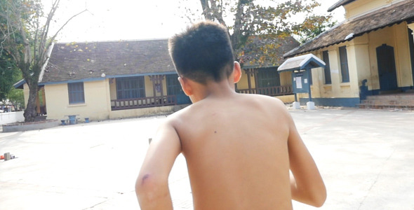 Kid Running With No Shirt alt