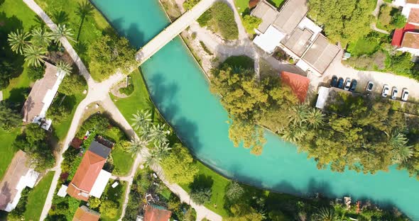 Aerial view of the town with hills in the background and Kibbutzim Stream.