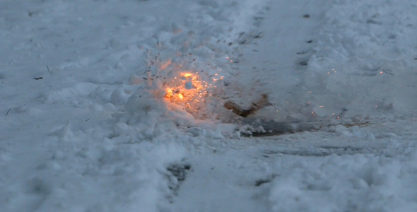 Firecracker Exploding In Snow