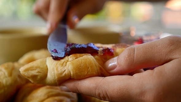 Breakfast with Fresh Croissants and Jam