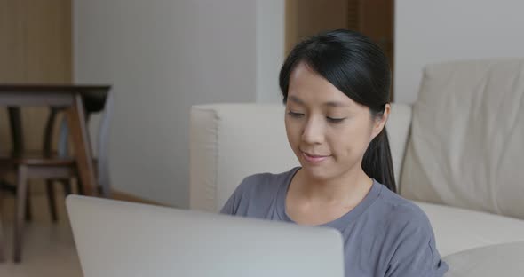 Woman work on computer at home