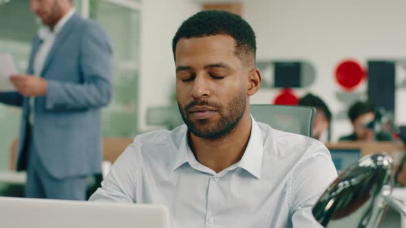 A Very Attractive Black Man is Looking Confident