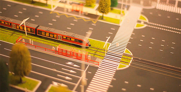 Model Train Moving on the Layout of the City