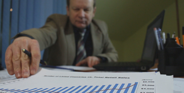 Businessman Working with Charts