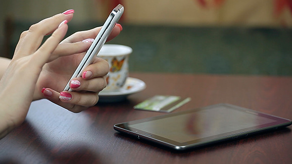 Woman Using Touch Screen Smartphone