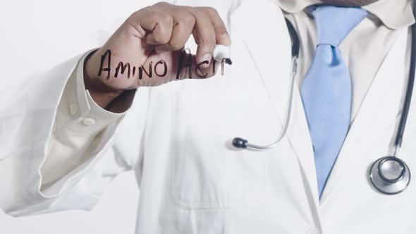 Asian Doctor Writes Amino Acids  