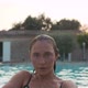 Beautiful Woman Relaxing in Swimming Pool at Luxury Hotel Spa and Enjoying Beautiful Sunset - VideoHive Item for Sale