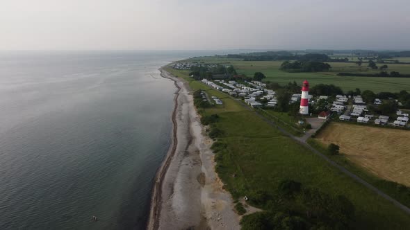 Aerial View of Beach in Northern Germany on a Summer Day with Lighthouse and Campground