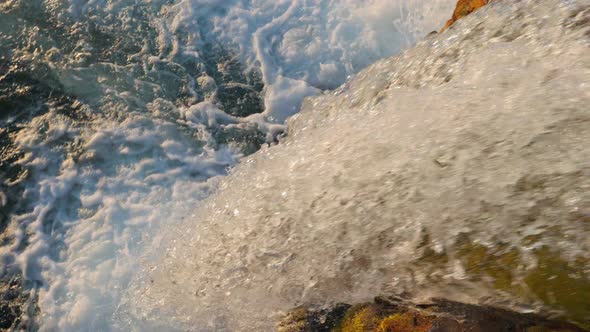 Closeup of Water of One of Cascades of Dynjandi Falls at Sunset Iceland