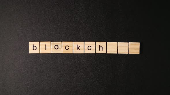 Wooden Cubes Open And Sets Up A Word «Blockchain"
