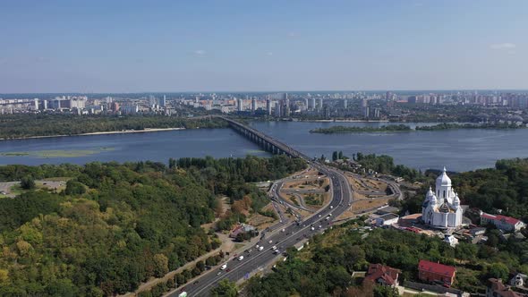 Capital of Ukraine - Kyiv city. Top view of cityscape, blue Dnipro.