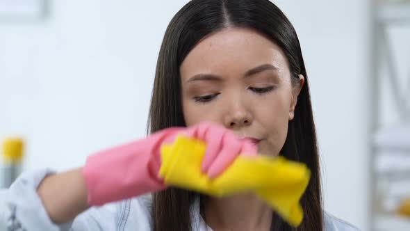 Tired Housewife Wiping Forehead, Exhausted Domestic Work, Everyday Routine