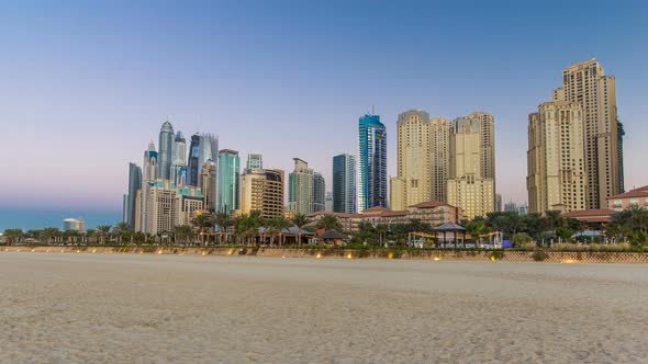 View of Modern Skyscrapers Day to Night Timelapse in Jumeirah Beach Residence in Dubai JBR